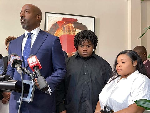 Attorney Roderick Edmond, from left, joined by Treveon Isaiah Taylor, Sr., Jessica Ross, speaks during a news conference, Wednesday, Aug. 9, 2023, in Atlanta, announcing a lawsuit against a doctor and Southern Regional Medical Center, a hospital south of Atlanta where Ross went on July 9 to have her son. A doctor used too much force and decapitated Ross's baby during delivery according to the lawsuit filed Wednesday, the attorneys said.  (AP Photo/Sudhin Thanawala)