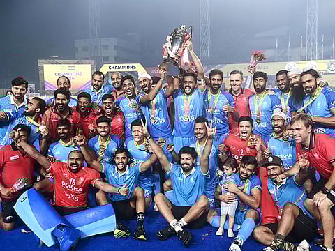 Indian players celebrate after winning the Asian Champions Trophy 2023 hockey tournament final against Malaysia at the Mayor Radhakrishnan Stadium in Chennai on August 12, 2023. 