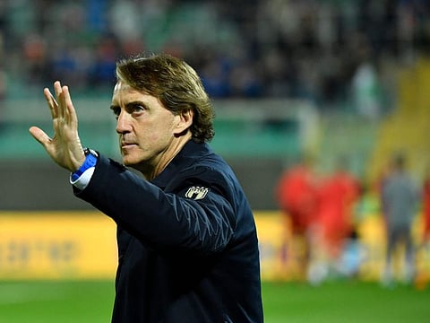 Italy's coach Roberto Mancini waves prior to the 2022 World Cup qualifying play-off match against North Macedonia in March 2022.