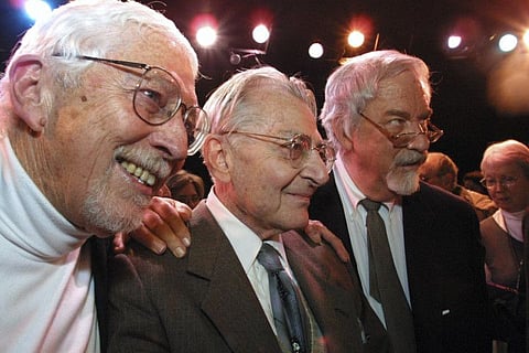 Lore Noto, the original producer of the off-Broadway musical, 'The Fantasticks," is flanked by the play's authors, Tom Jones, left, and Harvey Schmidt, at the tiny Sullivan Street Playhouse in New York's Greenwich Village, earlier this year.