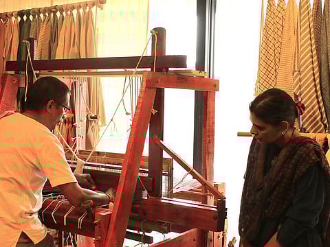 Hyderabad-based master weaver Vorugonda Odellu, seen working on his loom as Annapurna Mamidipudi looks on. Odellu is engaged in recreating ancient Greek weaves in collaboration with the European agency, Penelope Laboratory