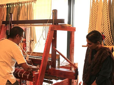 Hyderabad-based master weaver Vorugonda Odellu, seen working on his loom as Annapurna Mamidipudi looks on. Odellu is engaged in recreating ancient Greek weaves in collaboration with the European agency, Penelope Laboratory