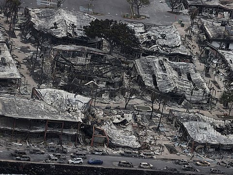 Views from the air of the community of Lahaina after wildfires driven by high winds burned across most of the town.