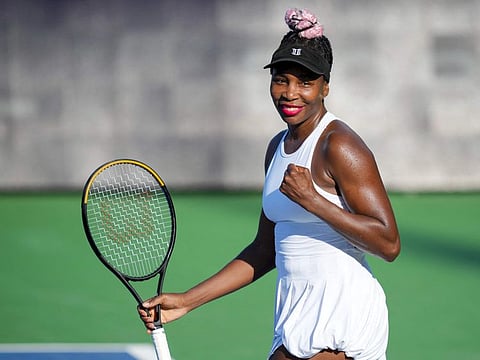 Venus Williams of the United States celebrates winning the match point against Veronika Kudermetova of Russia during their second-round match at the Western & Southern Open at Lindner Family Tennis Centre on Monday.