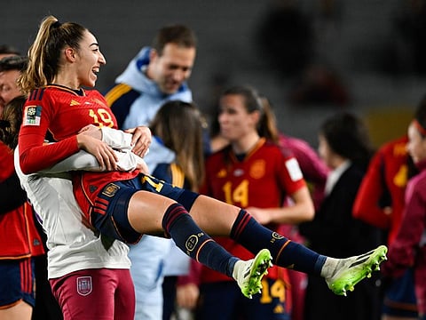 Spain's Olga Carmona is held aloft by a teammate after defeating Sweden in the Women's World Cup semi-final at Eden Park in Auckland on Tuesday.
