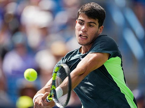 Carlos Alcaraz of Spain returns a shot to Max Purcell of Australia during their quarterfinal match at the Western & Southern Open at Lindner Family Tennis Center in Mason, Ohio.    