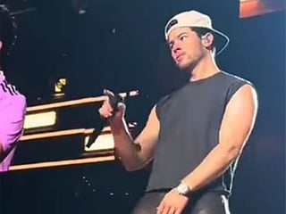 Watch: Nick Jonas hit with wristband during concert in Toronto