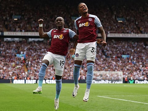 Aston Villa's Jamaican striker 31 Leon Bailey celebrates with Aston Villa's midfielder Moussa Diaby after scoring his team's third goal during the Premier League match against Everton at Villa Park in Birmingham on Sunday.