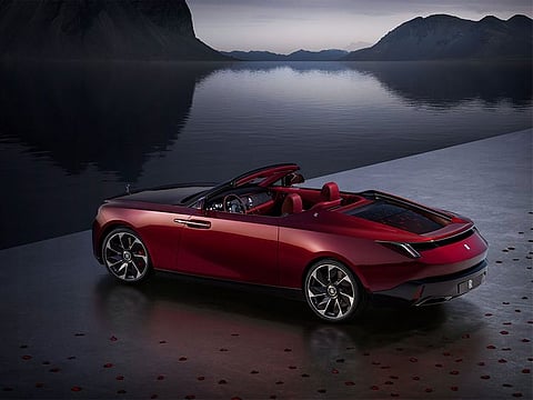 The Droptail has a low-slung, sleek exterior that looks like a high-tech luxury yacht; only the door handles, Spirit of Ecstasy hood ornament, and RR monogram interrupt the clean lines from front to rear. 