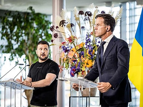 Ukrainian President Volodymyr Zelensky (L) and Dutch Prime Minister Mark Rutte give a joint press conference during a visit to Eindhoven Air Base, in Eindhoven on August 20, 2023. 