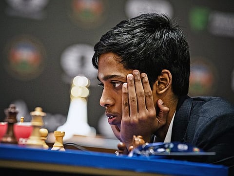 Praggnanandhaa ends first game in a draw against Magnus Carlsen in the Fide World Cup chess tournament, in Baku on Tuesday.
