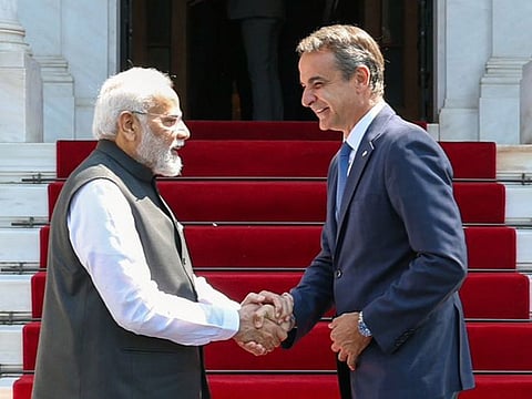 Indian Prime Minister Narendra Modi being welcomed by Greek Prime Minister Kyriakos Mitsotakis as he arrives at the Maximos Mansion for bilateral talks, in Athens on Friday, August 25, 2023. 