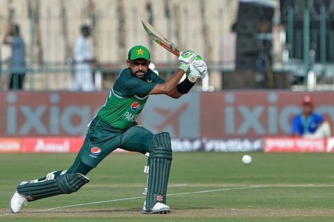 Pakistan's captain Babar Azam drives one to the fence during the Asia Cup match against Nepal at the Multan Cricket Stadium in Multan on Wednesday.