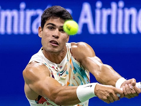 Spain's Carlos Alcaraz plays a backhand return against Germany's Dominik Koepfer during the US Open on Tuesday.