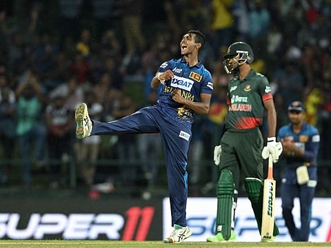 Sri Lanka's Matheesha Pathirana celebrates the wicket of Bangladesh's Taskin Ahmed during the Asia Cup match at the Pallekele International Cricket Stadium in Kandy on Thursday.