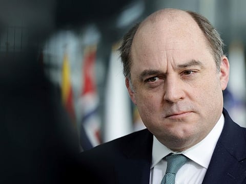 British Defence Minister Ben Wallace speaks with the media as he arrives for a meeting of NATO defense ministers at NATO headquarters in Brussels, Wednesday, March 16, 2022.