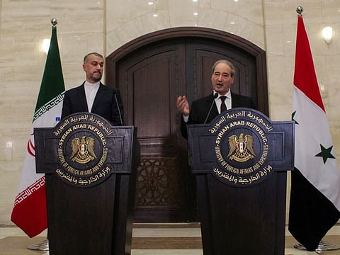 Syrian Foreign Minister Faisal Mekdad speaks during a joint news conference with Iranian Foreign Minister Hossein Amirabdollahian in Damascus on August 30, 2023.  