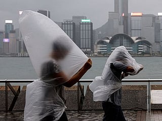 In Photos: Hong Kong issues highest level alert for Super Typhoon Saola