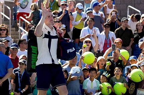 John Isner of the US reacts after losing to compatriot Michael Mmoh during the second round of the US, bringing an end to his glorious career.