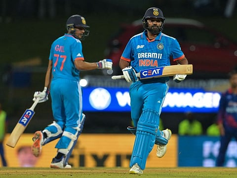 India's captain Rohit Sharma (right) and Shubman Gill run between the wickets during the Asia Cup ODI match against Nepal at the Pallekele International Cricket Stadium in Kandy on Monday.