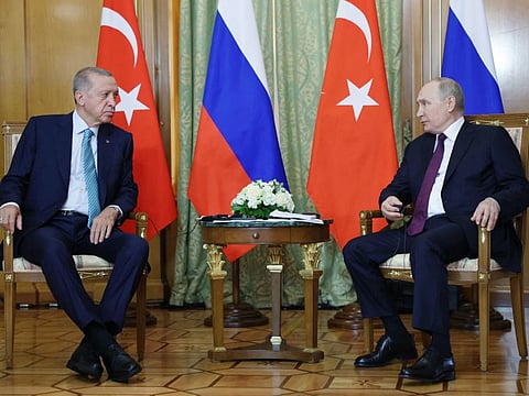 Russian President Vladimir Putin (right) and Turkish President Recep Tayyip Erdogan attend a meeting in Sochi.  