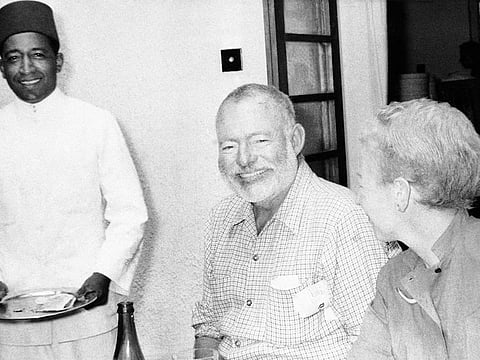 Hemingway with his wife Mary on Verandah of lake Victoria Hotel, Entebbe, January 30, 1954 after their rescue.  