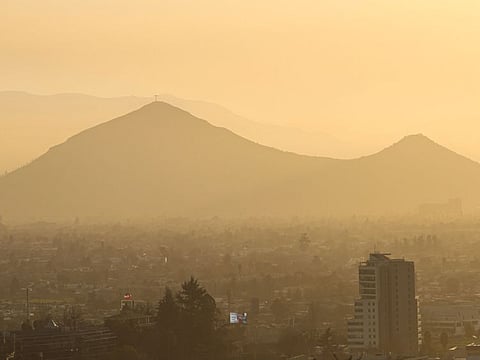 View of the smog over the city of Santiago on July 31, 2023.  