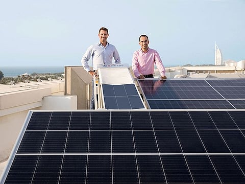 Professor Tadhg O'Donovan, Deputy Vice Principal of Heriot-Watt University Dubai (left) and Dr Mohamed Al-Musleh, Assistant Professor in the School of Engineering and Physical Sciences at Heriot-Watt University Dubai at the rooftop Solar Energy Test Site on the roof of the Dubai campus based in Dubai Knowledge Park