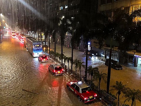 A general view of a flooded street after heavy rainstorms triggered a 'Black Rainstorm Warning' from the city’s weather observatory, in Hong Kong on September 7, 2023.