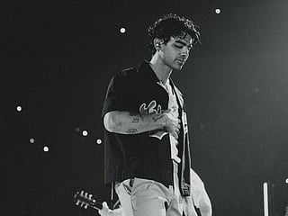 Singer Joe Jonas sheds a tear onstage for his wife and Hollywood star Sophie Turner