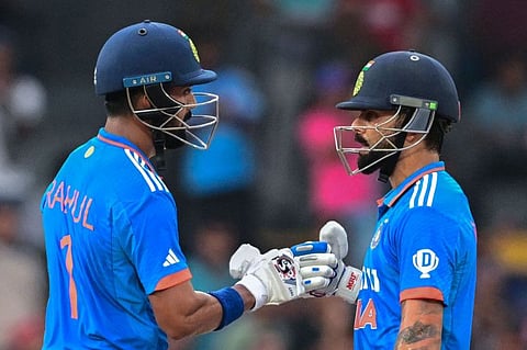 India's Virat Kohli (right) and KL Rahul bump their fists during the Asia Cup Super Four match against Pakistan at the R. Premadasa Stadium in Colombo on September 11.