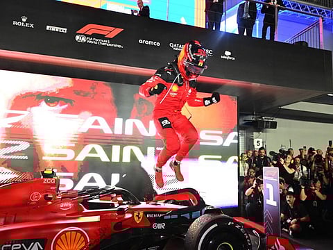 Ferrari's Carlos Sainz Jr. celebrates after winning the Singapore Grand Prix at the Marina Bay Street Circuit on Sunday.