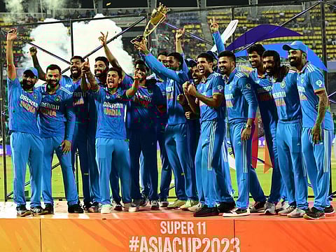 The Indias players celebrate with the trophy after winning the Asia Cup 2023 One-Day International final against Sri Lanka in Colombo on Sunday.