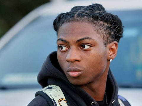 Darryl George, a 17-year-old junior, before walking across the street to go into Barbers Hill High School after serving a 5-day in-school suspension for not cutting his hair on Monday, September 18, 2023, in Mont Belvieu. 