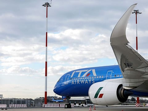 An Airbus A350 passenger aircraft, operated by ITA Airways, sits on the tarmac at Fiumicino airport in Rome, Italy.
