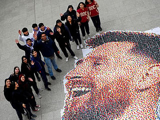 High school students create Argentina's soccer superstar Lionel Messi mural using bottle caps