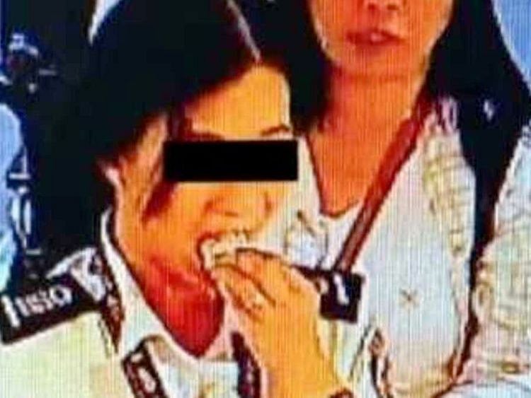 Manila airport officer swallows $300