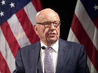 Rupert Murdoch says he will still stay 'active' after passing on the baton to son