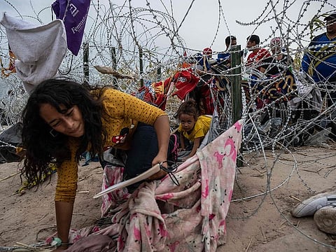 Dozens of migrants arrived at the US-Mexico border hoping to be allowed into the United States, with US border forces reporting 1.8 million encounters with migrants in the last 12 months.