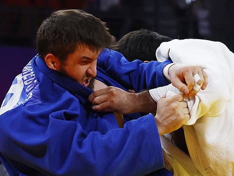 UAE's Magomedomarov Magomedomar in action with Tajikistan's Rakhimov Temur in the men's 100Kg gold medal contest at the Xiaoshan Linpu Gymnasium, Hangzhou, China on Tuesday.