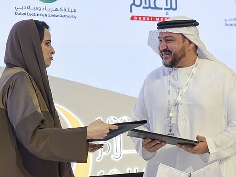 Khawla Al Mehairi, Executive Vice President of Strategy and Government Communications at DEWA and Abdulwahed Jumaa, CEO of Commercial Affairs and Partnerships Sector at Dubai Media, signed the agreement.
Photo Ahmad Alotbi/Gulf News