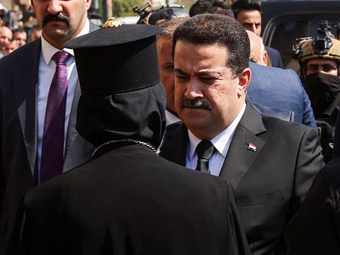 Iraqi Prime Minister Mohammad Shia Al Sudani at a church to offer condolences following a fatal fire at a wedding celebration, in Hamdaniya, Iraq, September 28, 2023.  