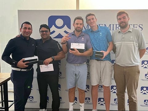 Winning Team from left to right, Naranj Sangal, Rohit Malhotra, James Jackson, Oliver Ravenscroft alongside Jonathan O'Brien Emirates golf Club Golf Experience Manager