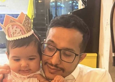 Al Suhaimi with his daughter, who also succumbed to her injuries.