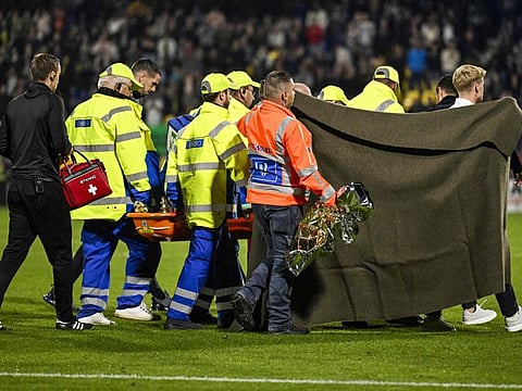 Waalwijk's goalkeeper Etienne Vaessen is carried on a stretcher after he collapsed during the Dutch Eredivisie match against Ajax Amsterdam at the Mandemakers Stadium in Waalwijk on Saturday.