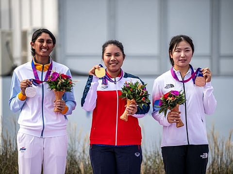 From left: Silver medallist India's Aditi Ashok, gold medallist Thailand's Arpichaya Yubol and bronze medallist South Korea's Yoo Hyunjo attend the medal ceremony for the women's individual golf event at the Hangzhou on Sunday.