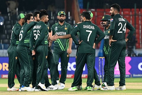 Pakistan team celebrates the wicket of New Zealands Rachin Ravindra during a warm-up match at the Rajiv Gandhi International Cricket Stadium in Hyderabad on September 29.