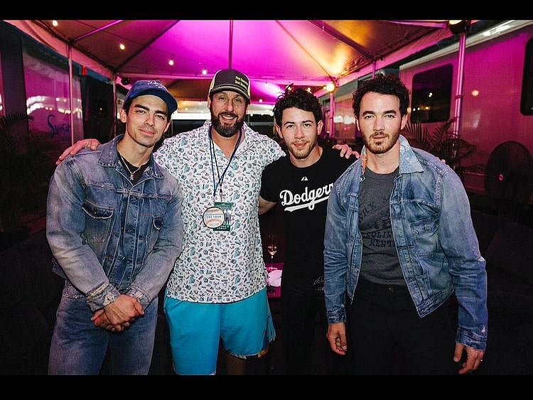 Hollywood actor Adam Sandler with the Jonas Brothers.