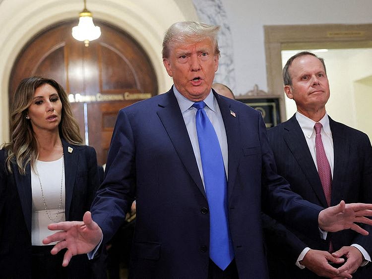 Former US President Donald Trump arrives at a Manhattan courthouse, for the trial of himself, his adult sons, the Trump Organization and others in a civil fraud case brought by state Attorney General Letitia James, in New York City, on October 2, 2023.