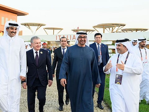 Sheikh Mohamed bin Zayed Al Nahyan (2nd R) tours the International Horticultural Expo 2023 Doha, at Al Bidda Park.